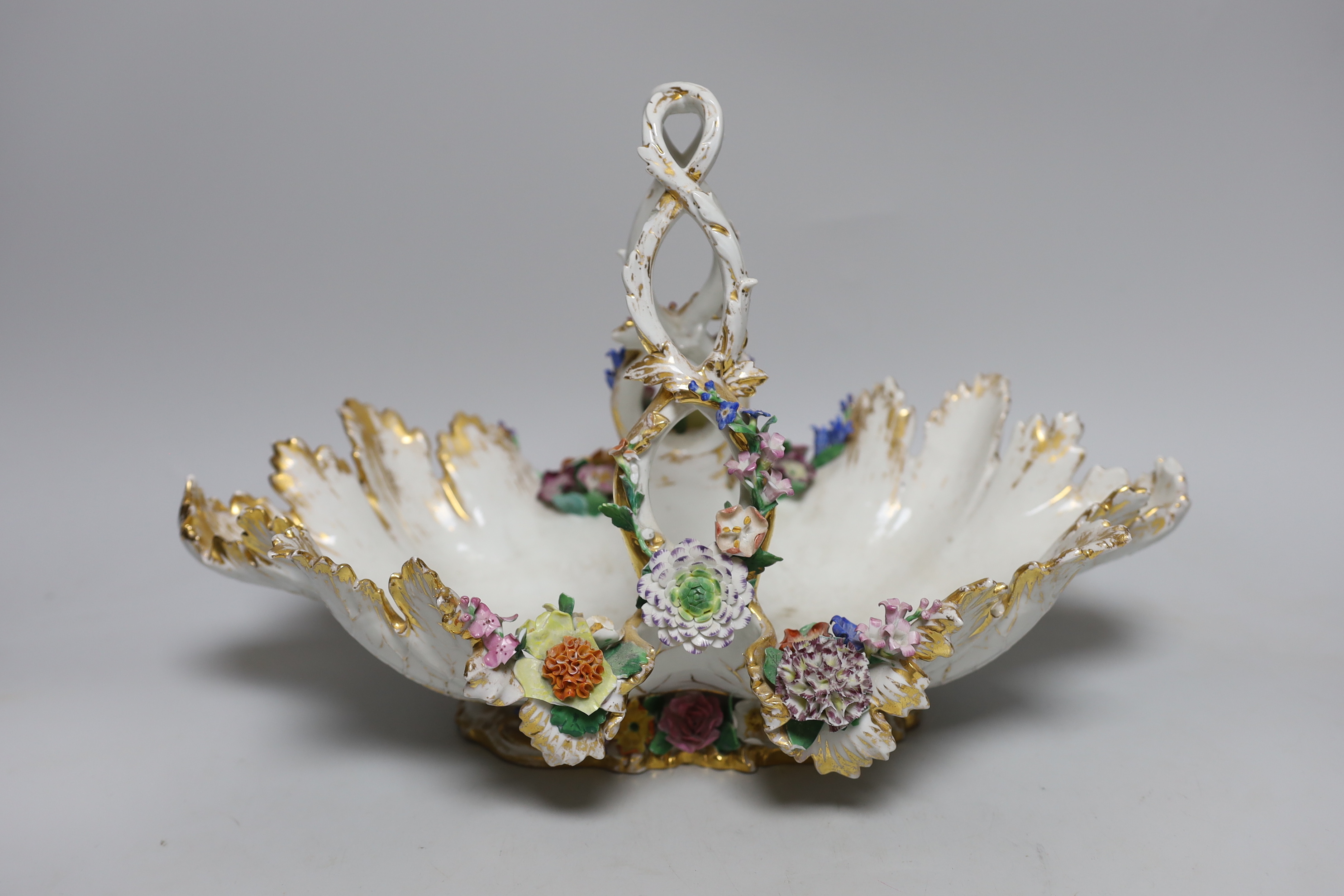 A large Meissen basket encrusted with flowers, 39cm long
